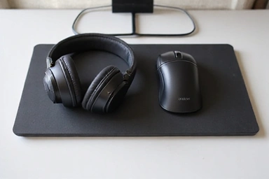 Wireless charging pad for computer peripherals